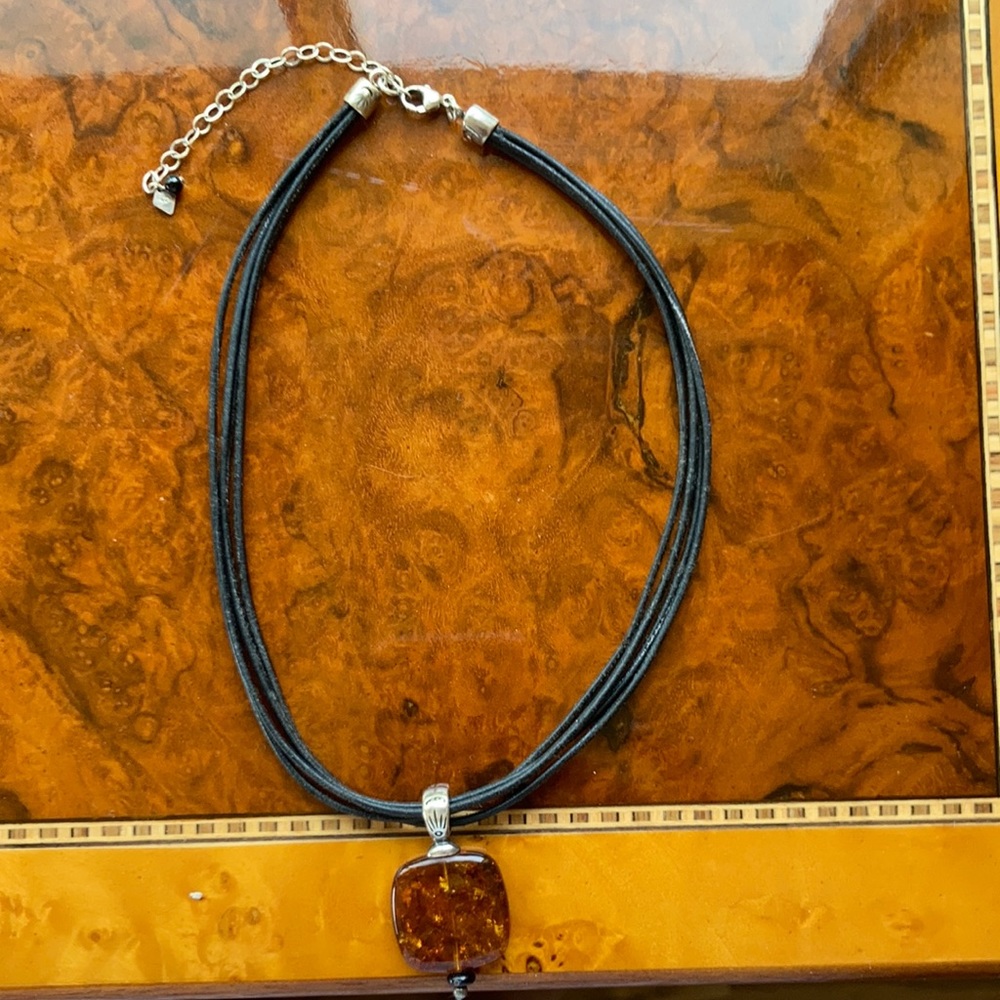 Silpada Leather, sterling and amber pendant.